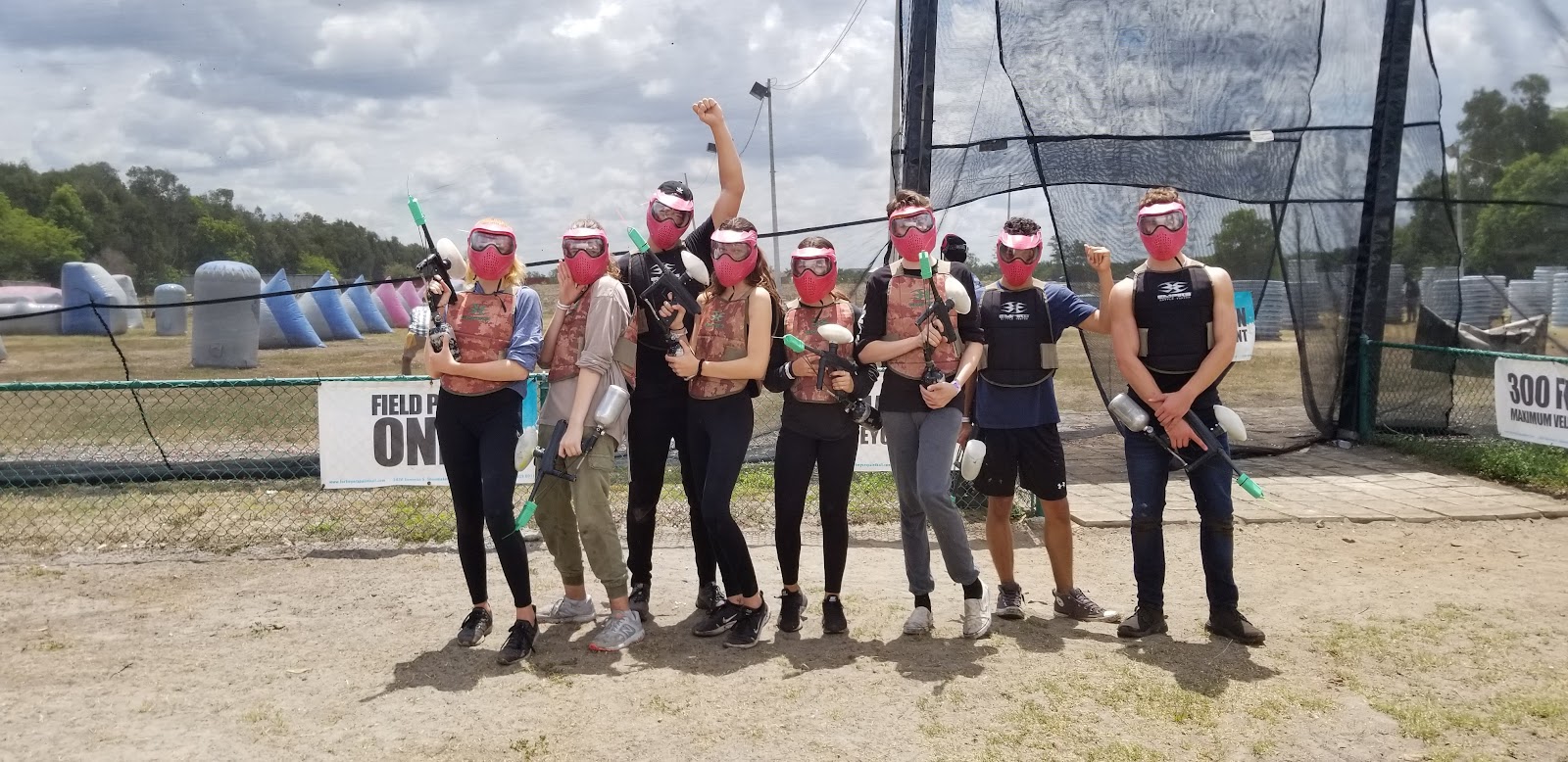 Church youth group celebrating after paintball at Fort Myers Paintball Park